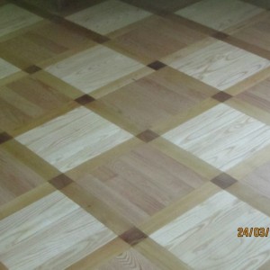 Cabinet Pattern

Extremely elegant design perfect for the classic rooms. 
 Works out living rooms and offices.
 Squares of light and dark ash wood arranged alternately. They are surrounded by stripes of oak wood and elm cubes.

 Material: light ash, dark ash, oak, elm.